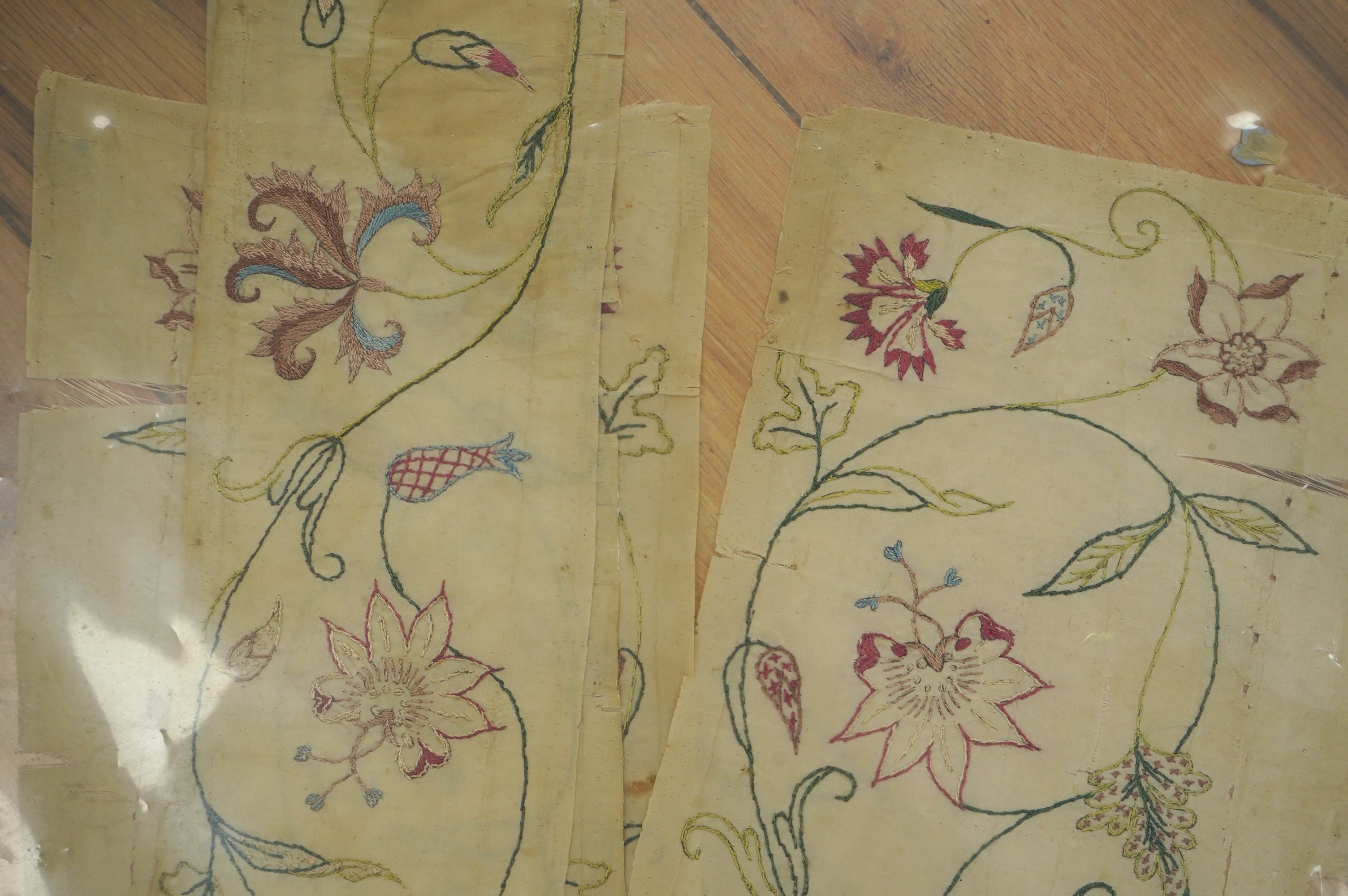 Two pairs of 18th century embroidered silk dress panels, one pair sleeve panels, the other pair possibly bodice panels, all panels hand embroidered in multi-coloured silk threads into a floral vineous design, sleeve pane